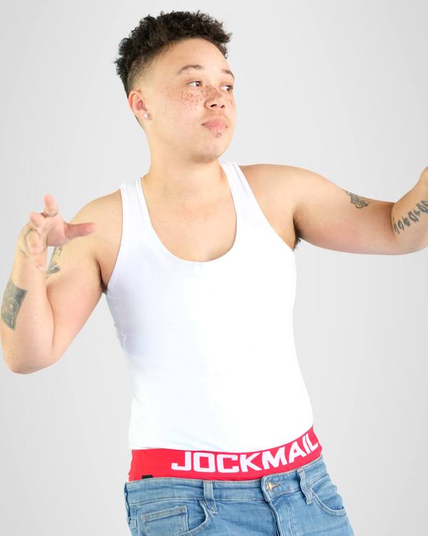 Person wearing white long binder