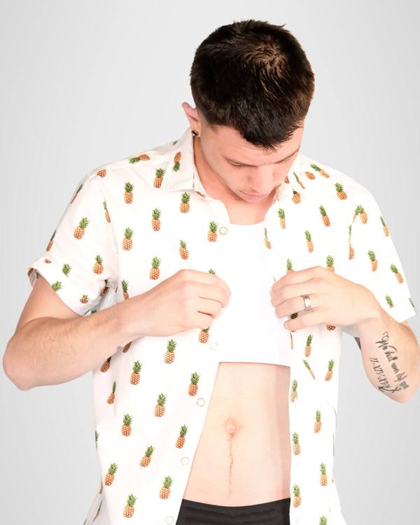 Model wearing Mid Chest Binder under the shirt
