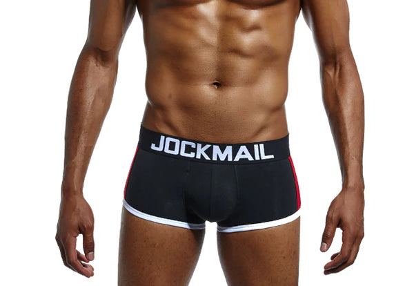 A model wearing black Jockmail underwear, showcasing the brand's design